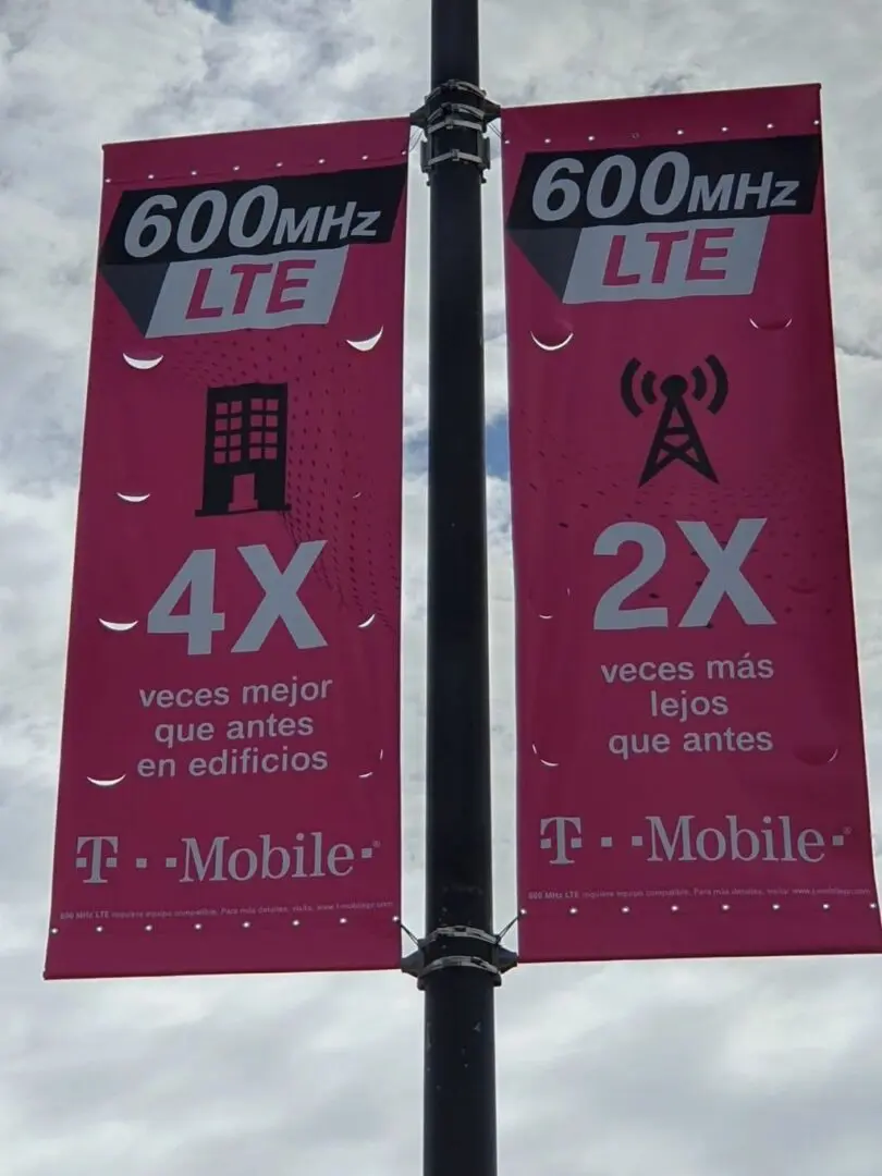 Aposter of t mobile on a pole for 600mhz Lte 4x and 2x